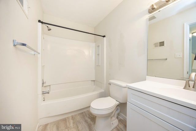 full bathroom with visible vents, toilet, shower / tub combination, and wood finished floors