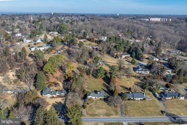 bird's eye view featuring a view of trees