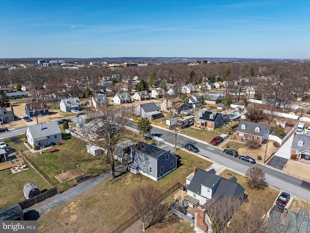 birds eye view of property with a residential view