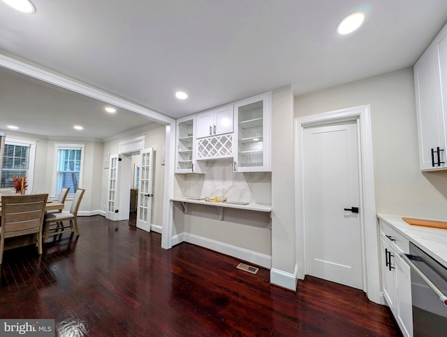 interior space featuring dark wood finished floors, visible vents, recessed lighting, and baseboards