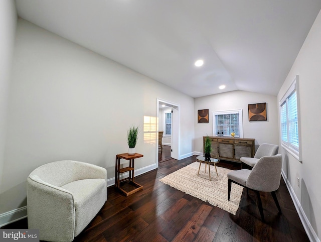 living area featuring dark wood-style floors, recessed lighting, baseboards, and vaulted ceiling