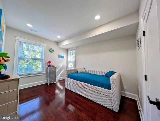 bedroom featuring recessed lighting, baseboards, and wood finished floors