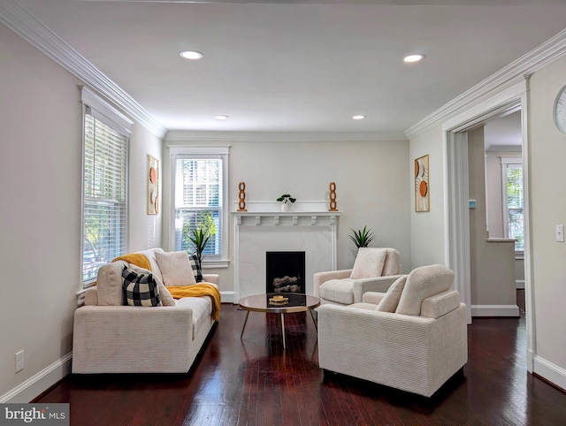 living room featuring a wealth of natural light, baseboards, and wood finished floors