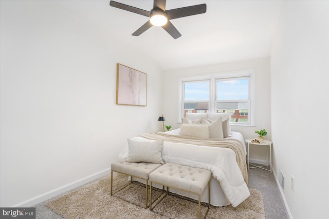 bedroom featuring carpet, baseboards, and ceiling fan