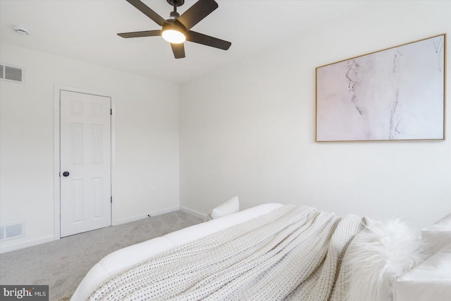 bedroom with visible vents, baseboards, and carpet flooring