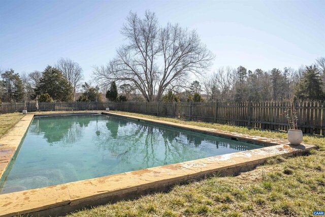 view of pool with a fenced backyard and a fenced in pool