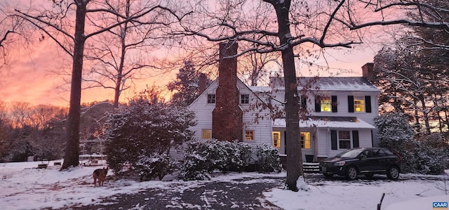 view of front of property with a chimney
