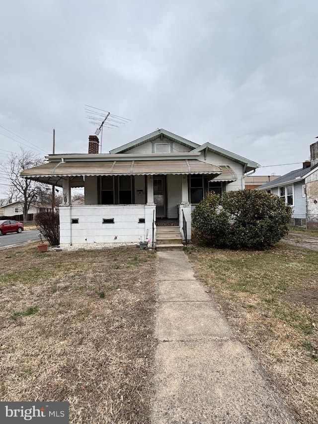 bungalow-style house featuring covered porch