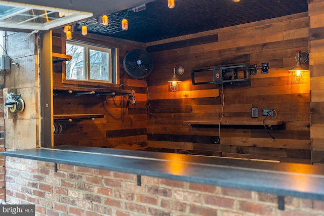 bar featuring wooden walls