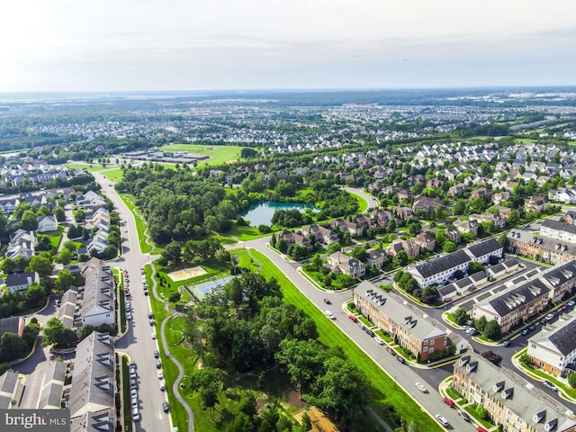 aerial view with a residential view and a water view