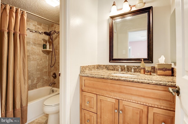 bathroom with toilet, shower / bath combo, a textured ceiling, tile patterned flooring, and vanity