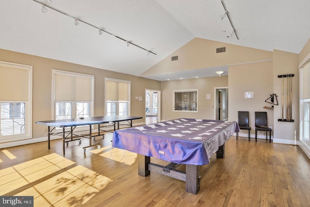 recreation room with visible vents, baseboards, and wood finished floors