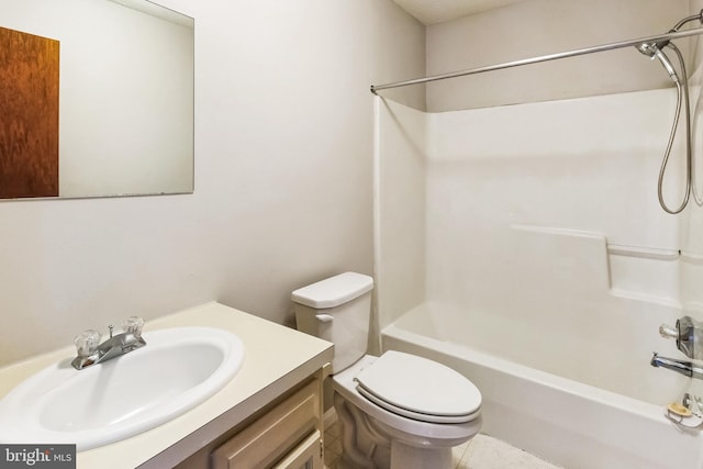 bathroom with vanity, shower / bathing tub combination, and toilet