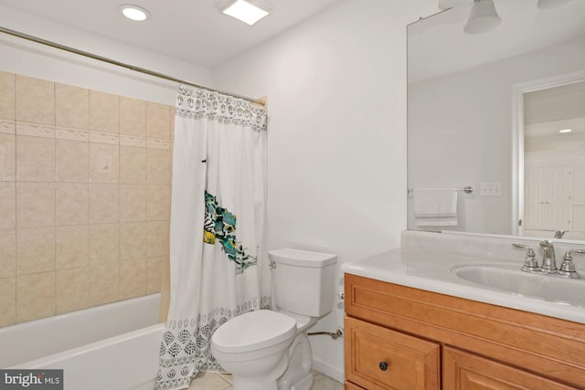 full bathroom featuring shower / bath combo with shower curtain, toilet, and vanity