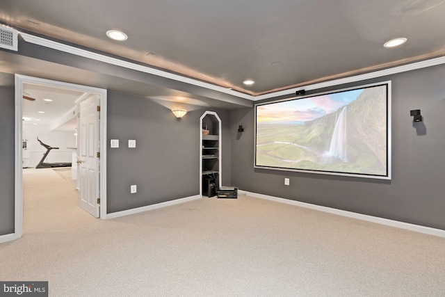 carpeted cinema room featuring recessed lighting, baseboards, and ornamental molding