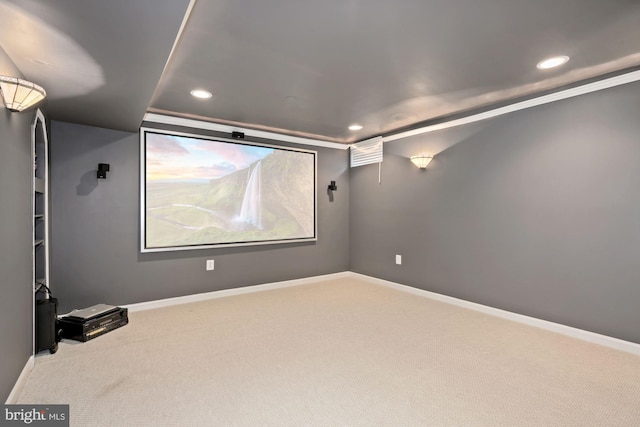 carpeted cinema with recessed lighting and baseboards