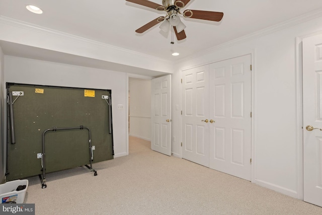 workout area with recessed lighting, baseboards, carpet, and crown molding