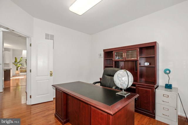 office area with light wood-type flooring