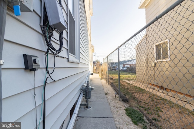 view of side of property with fence