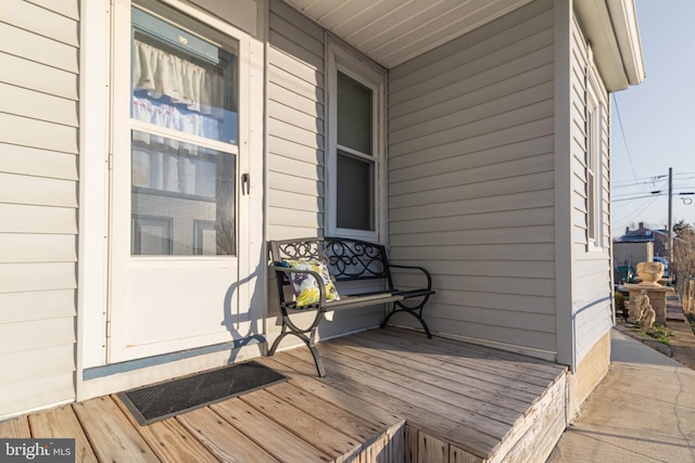 wooden terrace with a porch