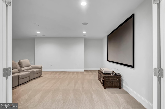 carpeted cinema featuring recessed lighting and baseboards