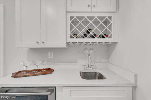 bar with a sink and wet bar