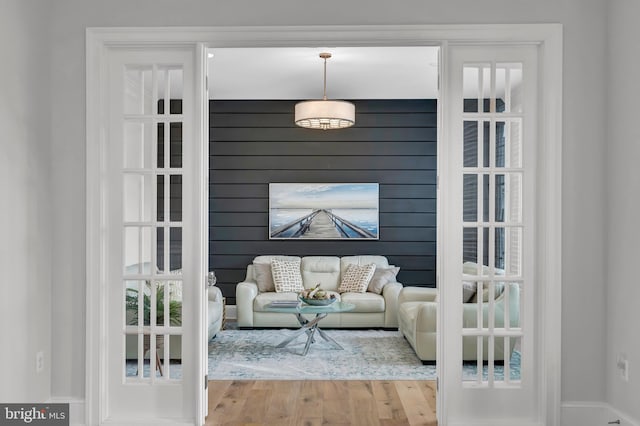 sitting room featuring wood finished floors