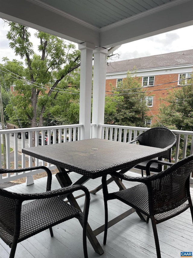 balcony with outdoor dining area