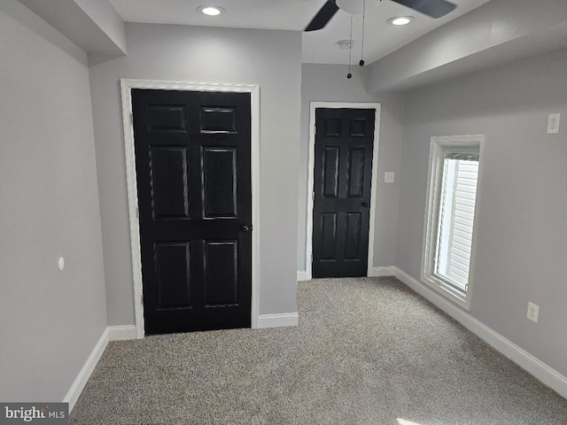 interior space featuring recessed lighting, ceiling fan, and baseboards