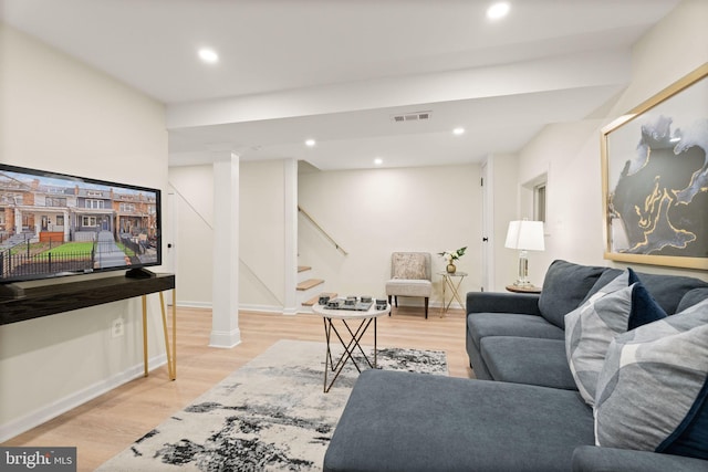 living area with stairs, light wood-style flooring, recessed lighting, and visible vents