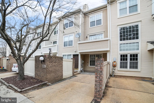 view of front of home with fence