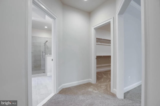 corridor with recessed lighting, baseboards, and carpet floors