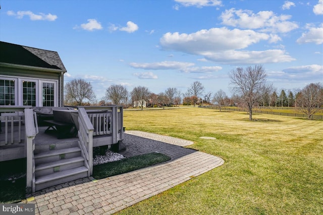 view of yard with a wooden deck