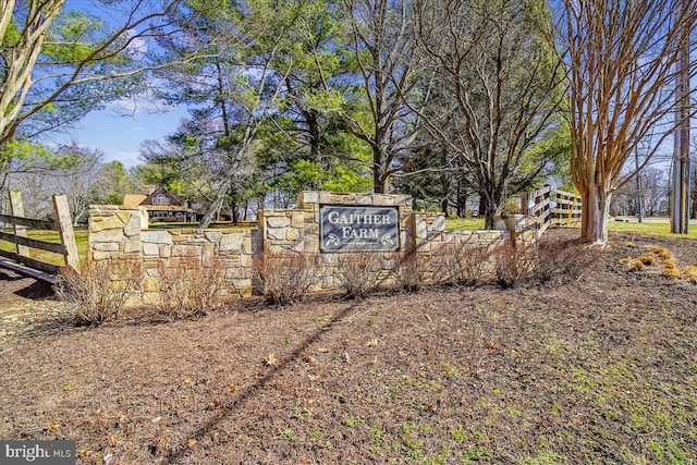 community sign with fence