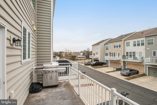 balcony featuring a residential view and area for grilling