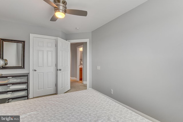 bedroom with baseboards, a ceiling fan, and carpet flooring