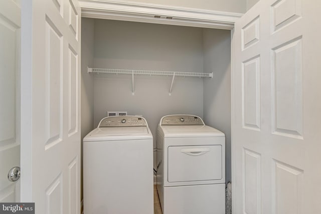 laundry room featuring laundry area and independent washer and dryer