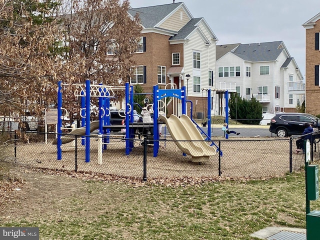 view of play area featuring fence