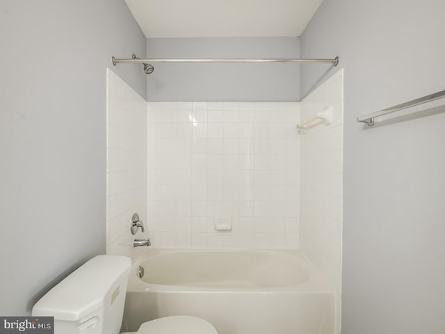 bathroom with toilet and tub / shower combination