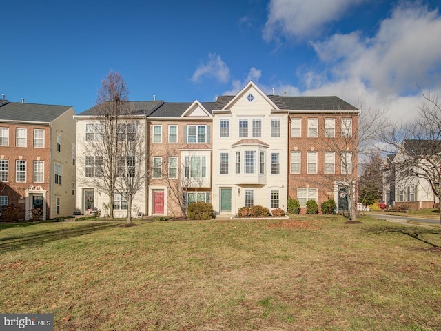 view of front of house with a front lawn