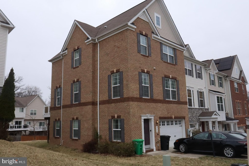 view of building exterior featuring a garage