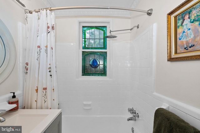 full bath featuring vanity and shower / tub combo with curtain