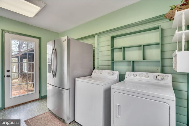 washroom with washer and dryer and laundry area