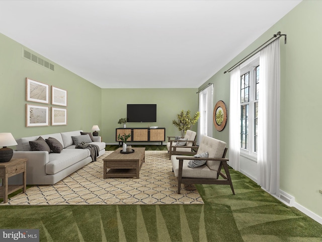 living room with visible vents, carpet flooring, and baseboards