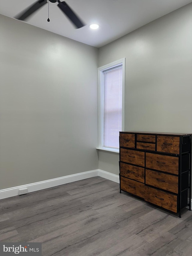 bedroom with recessed lighting, ceiling fan, baseboards, and wood finished floors