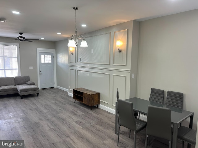 dining space featuring recessed lighting, baseboards, ceiling fan, and wood finished floors