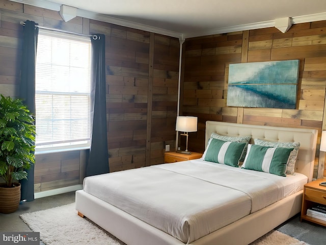 bedroom with wooden walls