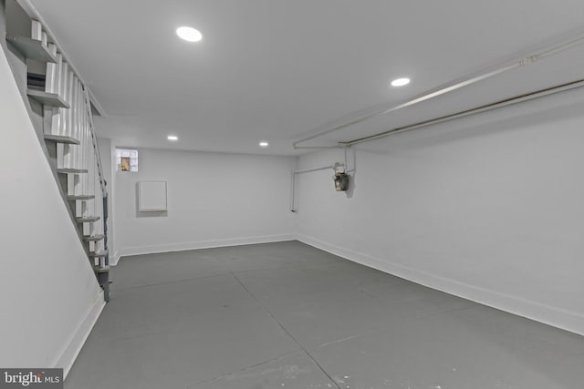 finished basement with recessed lighting and baseboards