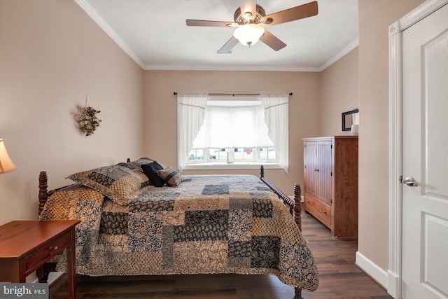 bedroom featuring baseboards, wood finished floors, ornamental molding, and a ceiling fan