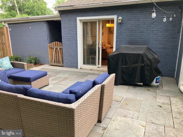 view of patio / terrace featuring area for grilling and outdoor lounge area